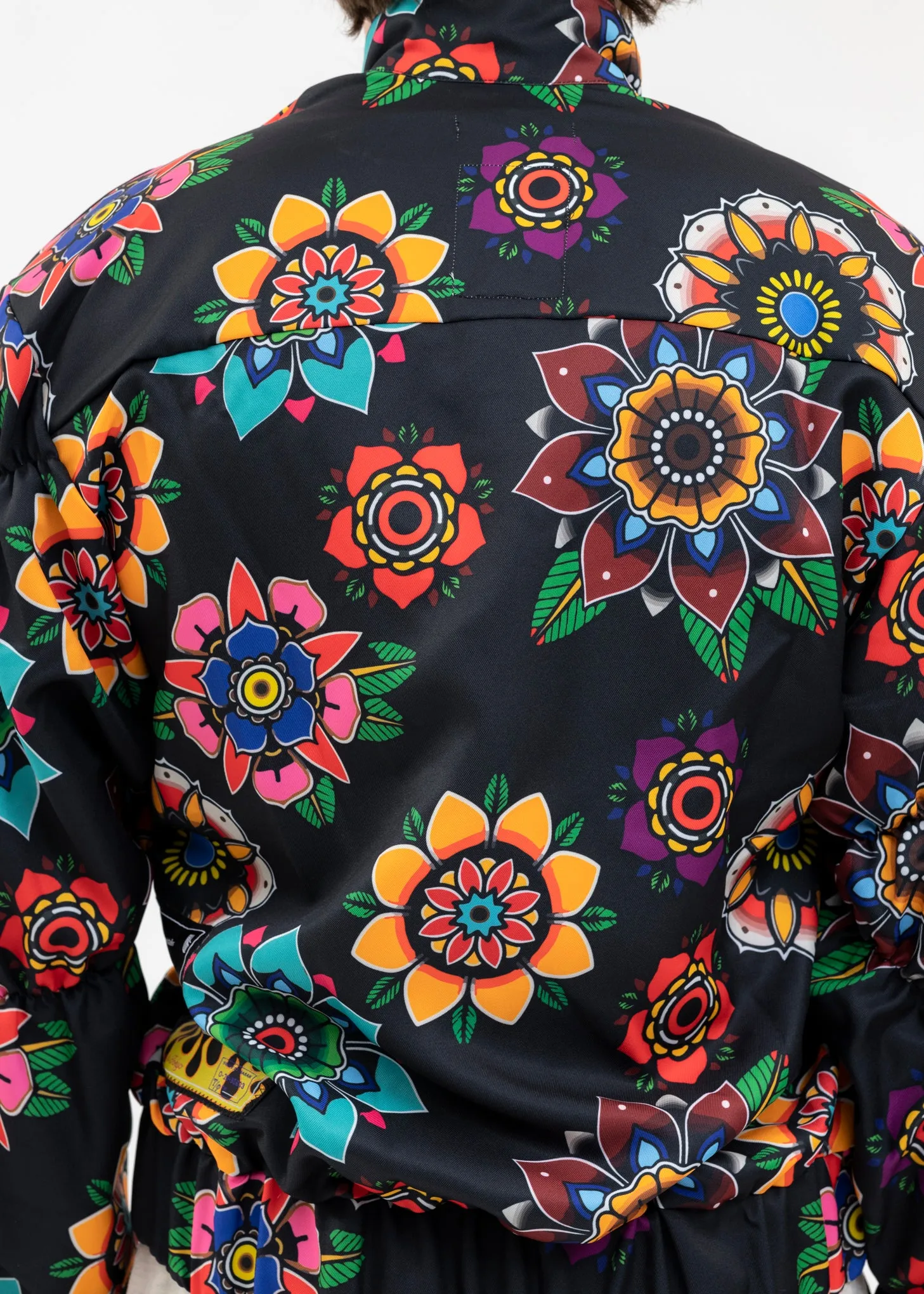 BLACK FLOWER PATTERN TRACK TOPS